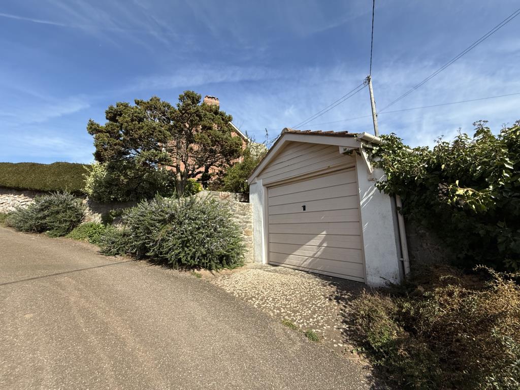 Lot: 153 - SEMI-DETACHED PROPERTY WITH SPECTACULAR WATERSIDE VIEWS, FOR REPAIR AND REFURBISHMENT - General view of the garage